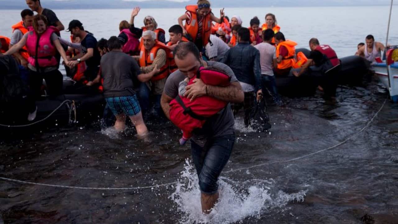 The head of the European Union's executive says 22 of the member states should be forced to accept another 120,000 people in need of international protection who have come toward the continent at high risk through Greece, Italy and Hungary.