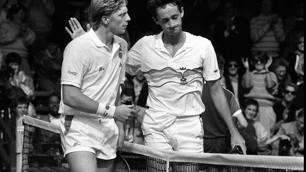 Former Australian tennis player Peter Doohan (R) consoles Boris Becker