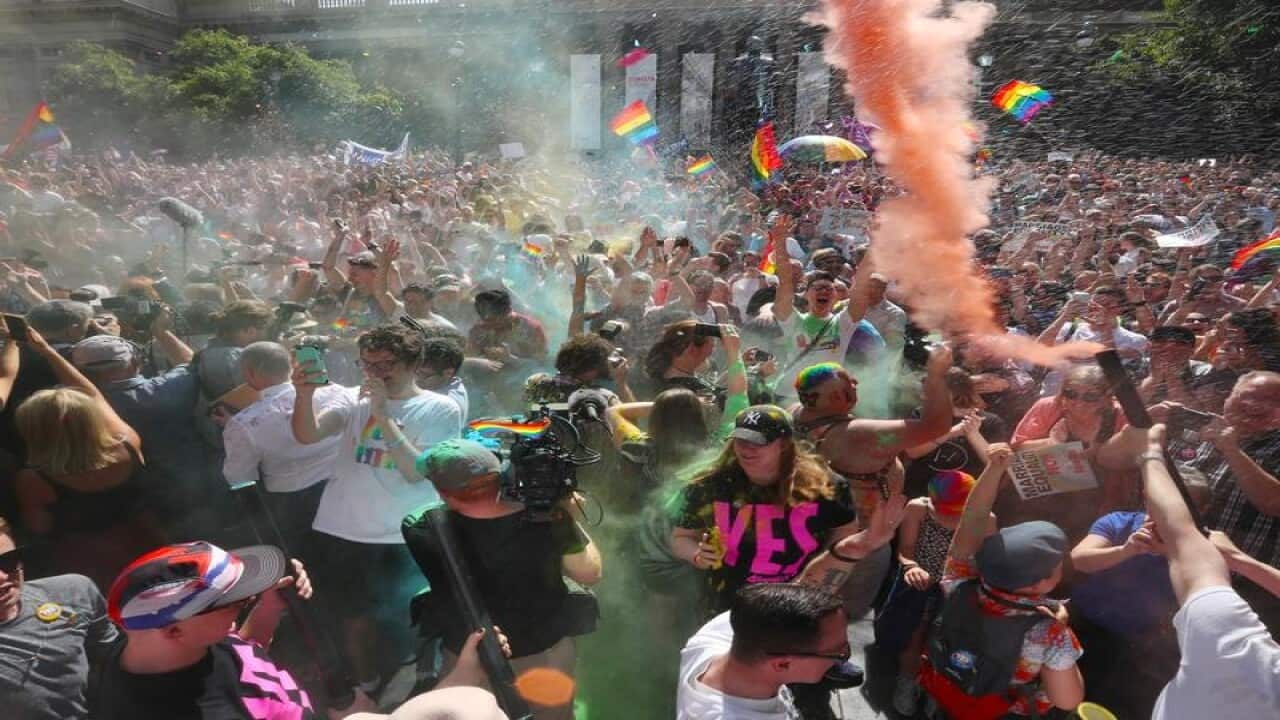 The crowd react to the same-sex marriage postal survey Yes result.