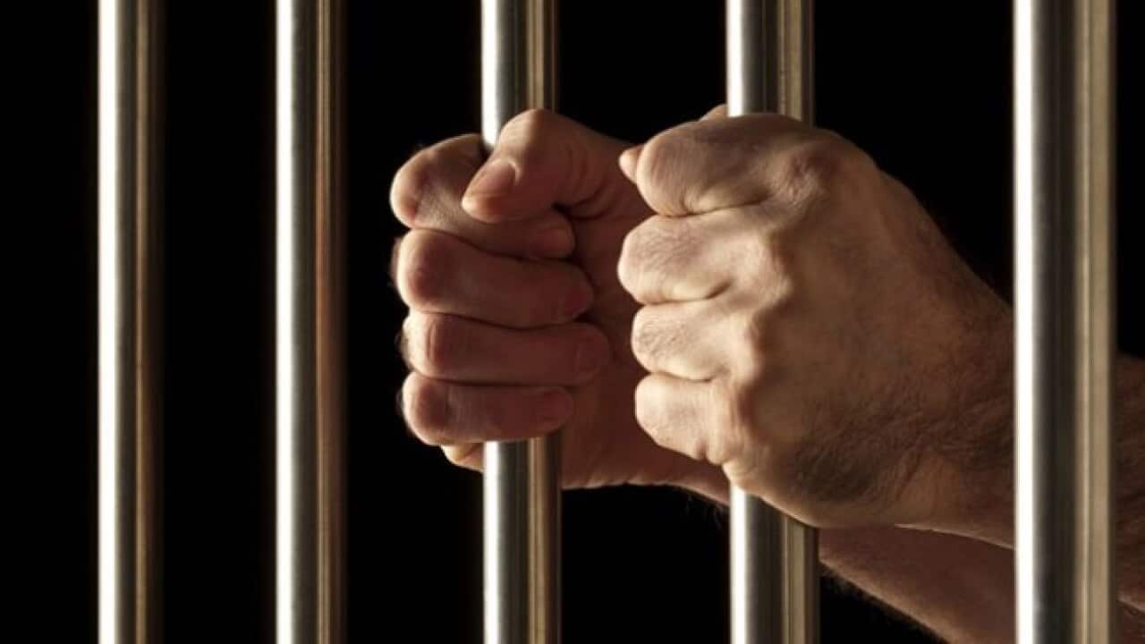 Behind bars