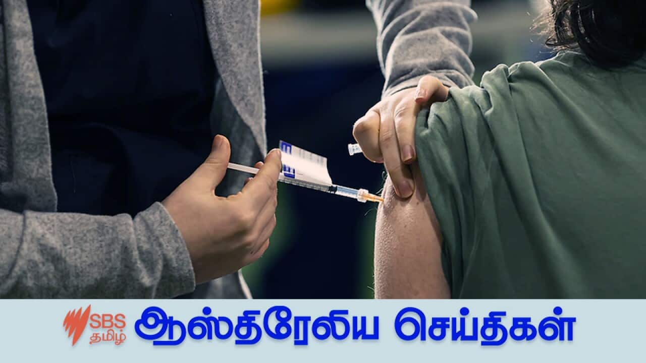 A person receives a vaccination at a pop-up vaccination clinic at Casey Fields in Melbourne