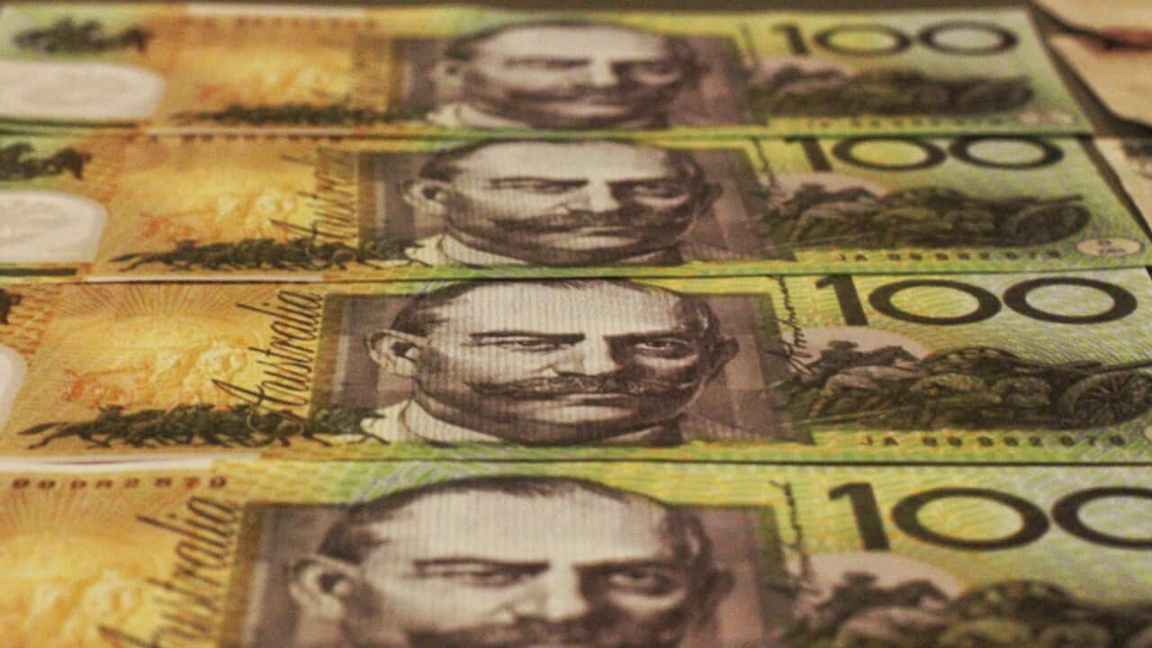 100 dollars Australian bank note by Joshua Hoehne via Unsplash.jpg