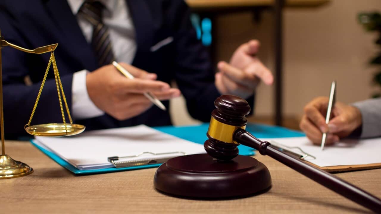 A man with his lawyer - GettyImages