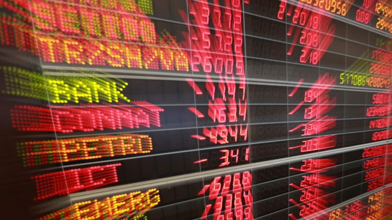 An electronic board shows stock prices at a private stock trading floor Bangkok, Thailand.