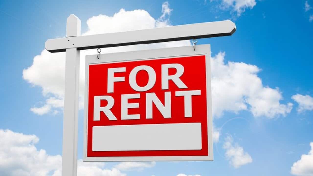 For Rent signpost on sky