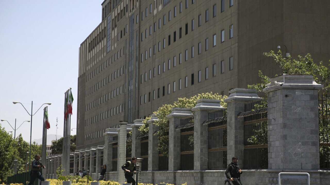 Police officers take position around Iran's parliament in Tehran