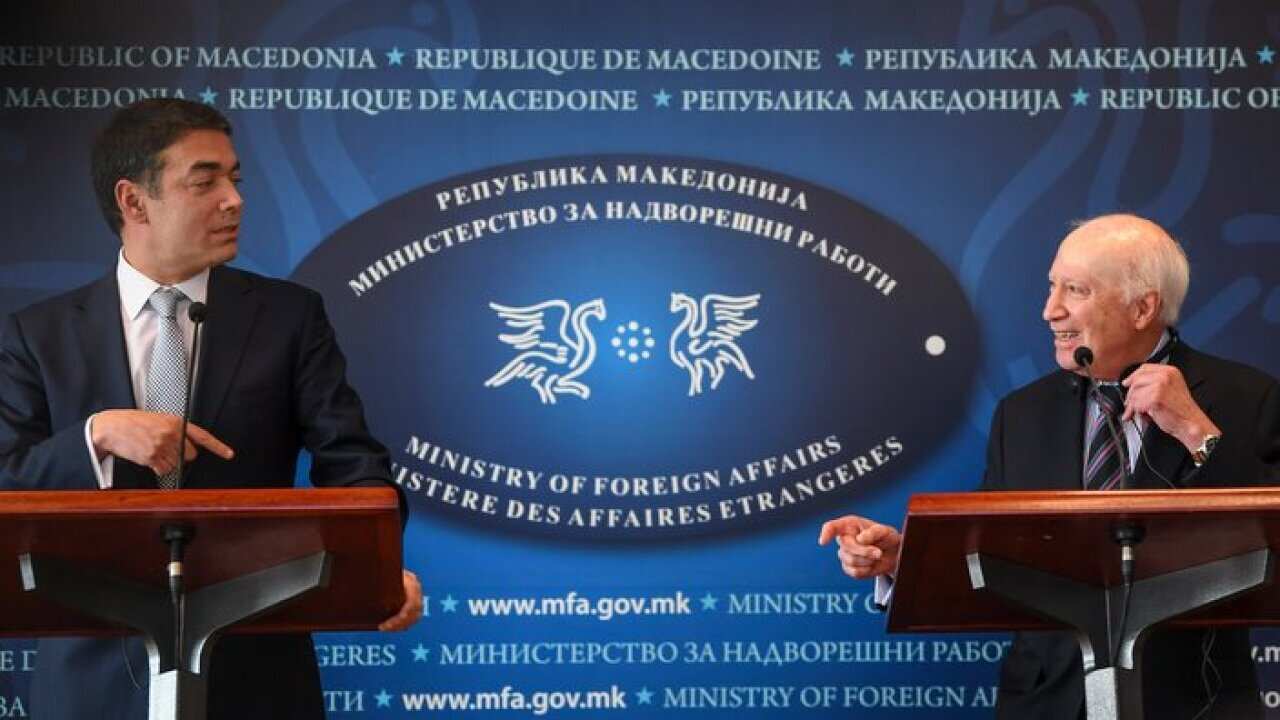 Macedonian Minister of Foreign Affairs Nikola Dimitrov (L) and United Nations mediator Matthew Nimetz (R)