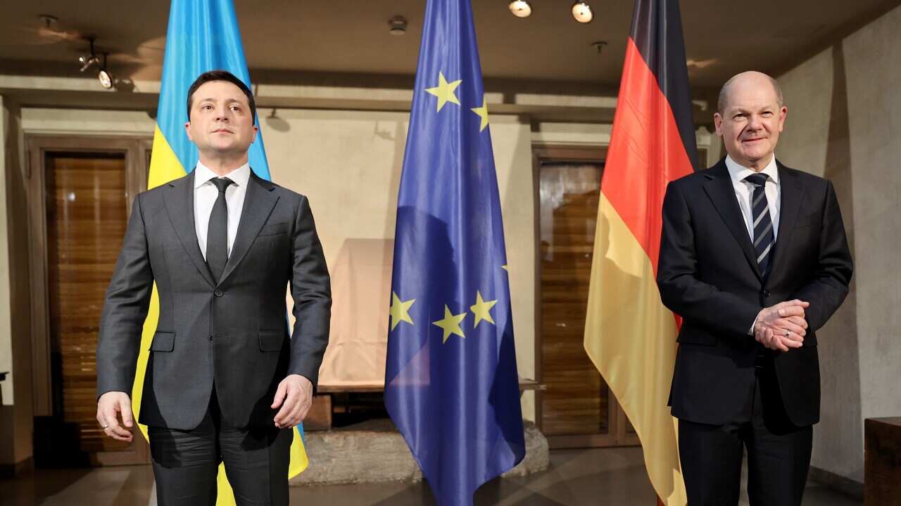 German Chancellor Olaf Scholz (R) and Ukrainian President Volodymyr Zelensky at the 2022 Munich Security Conference in Munich, Germany, 19 February 2022.
