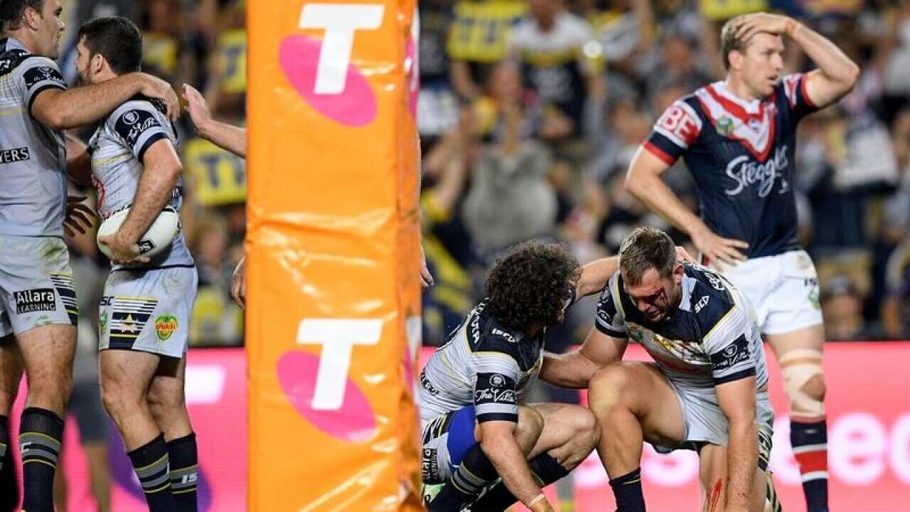 Scott Bolton scores for North Queensland.