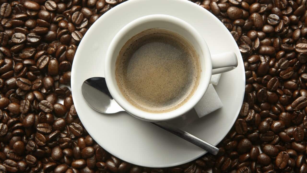 Coffee cup and beans