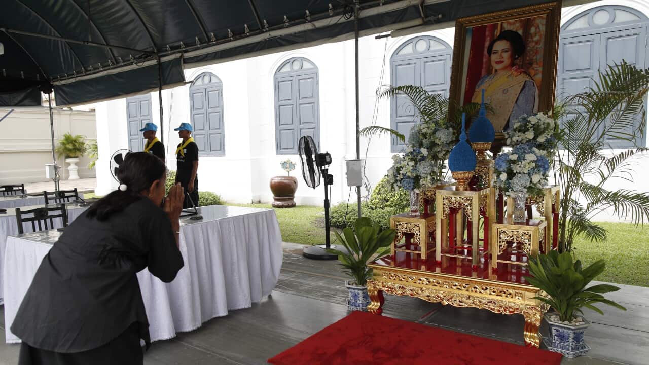 Thai people pay respect to the late Queen Mother Sirikit