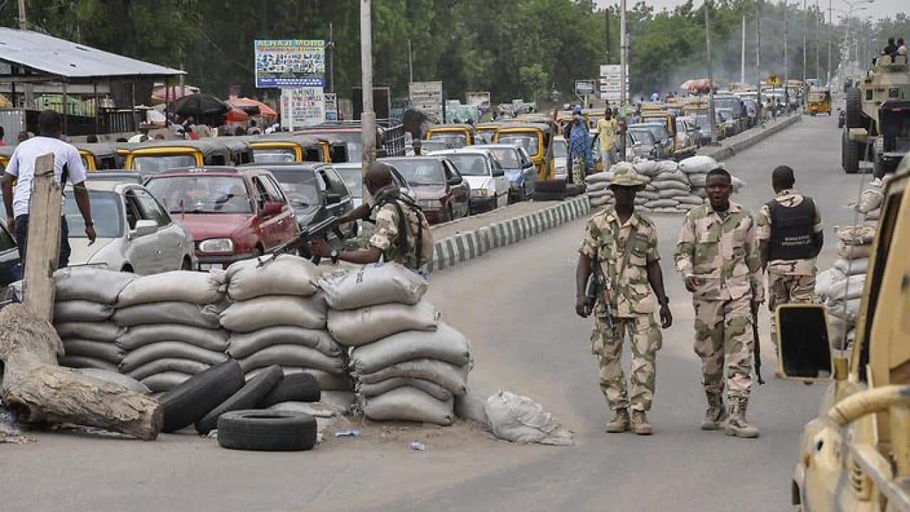 An undated photograph from 2014 made available 13 January 2015 shows members of the Nigerian military manning checkpoints in Maiduguri (File: EPA)