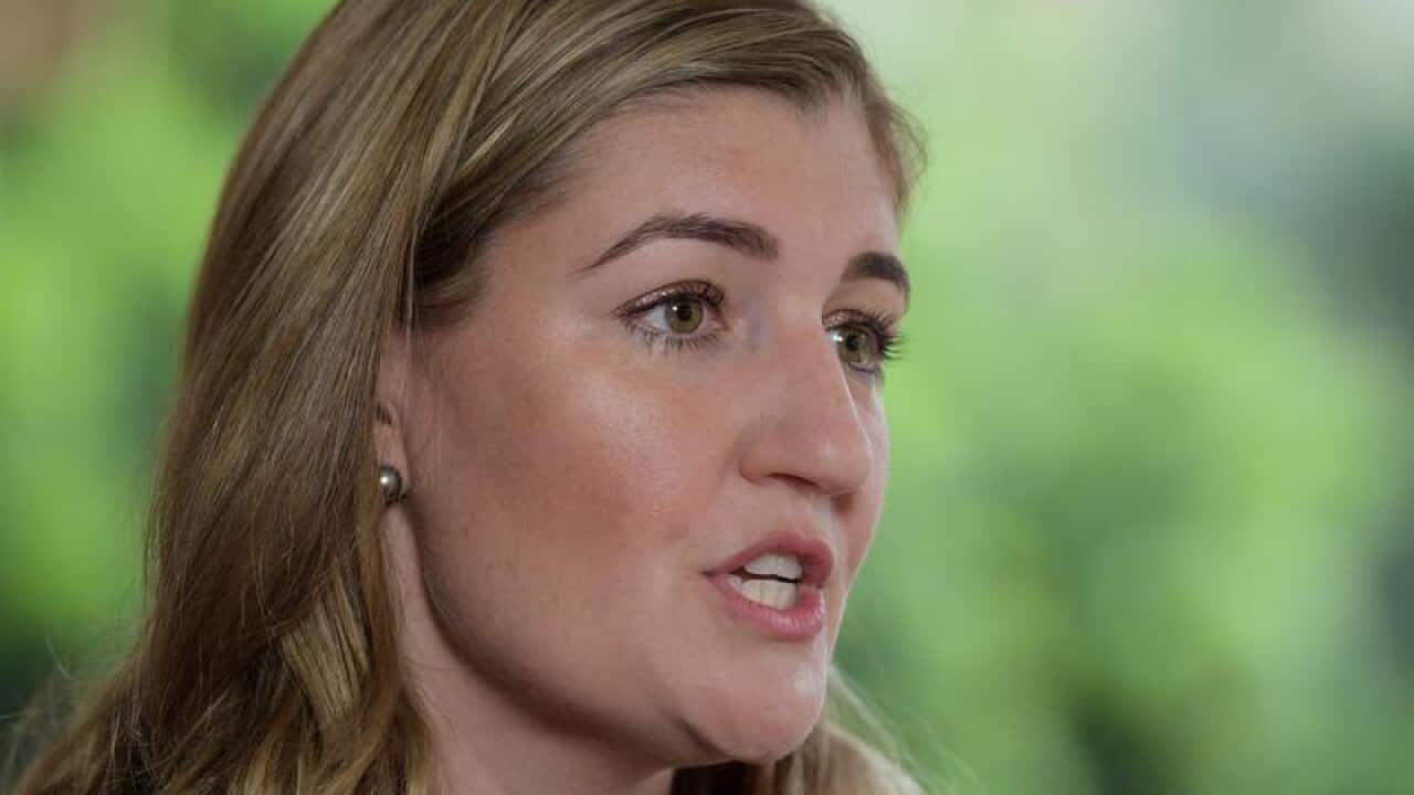 Minister Shannon Fentiman speaks to media at Queensland Parliament