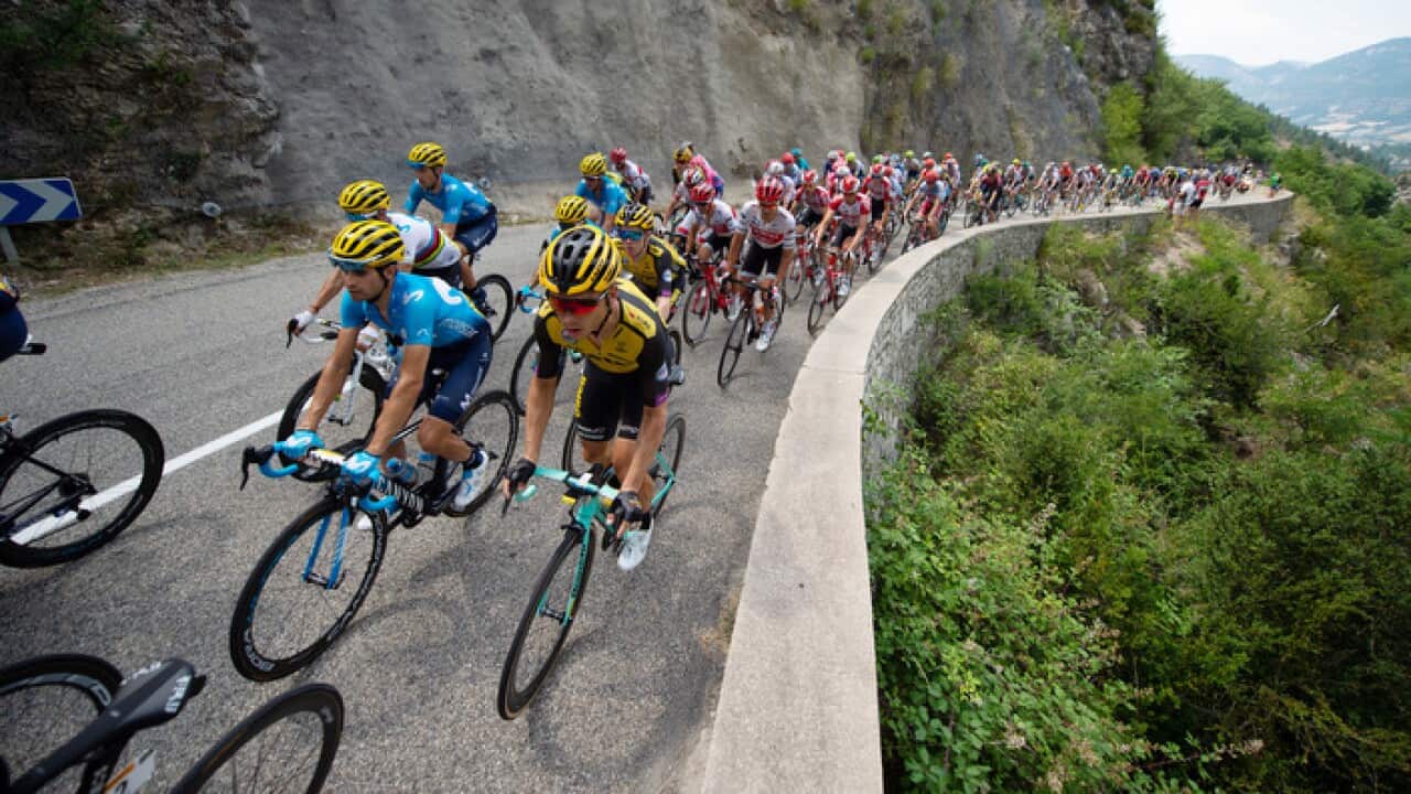 The peloton ride over the first climb of the day - the Cote de La Rochette du Buis in the Tour de France Stage 17