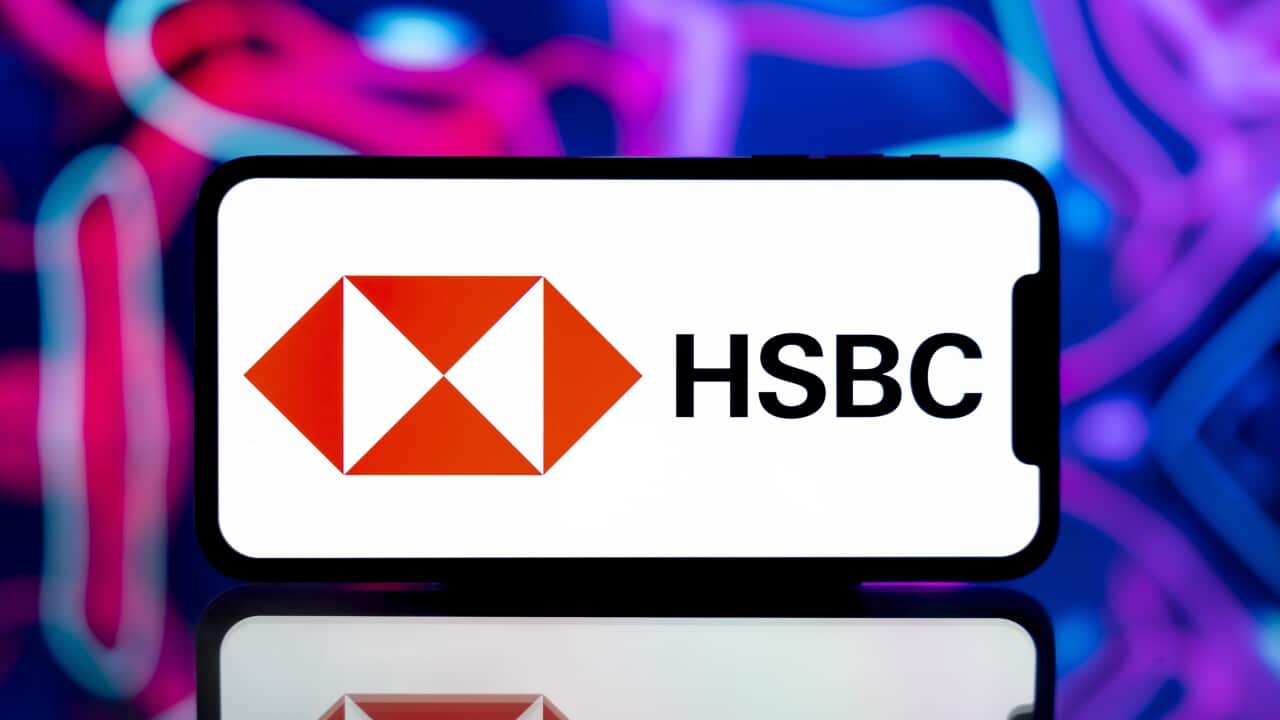In this photo illustration, the HSBC logo is seen displayed