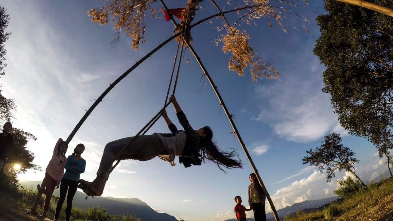 A representative image. Children play on a bamboo swing in Kathmandu during the Dashain festival in Kathmandu, Nepal, 9 October 2016.