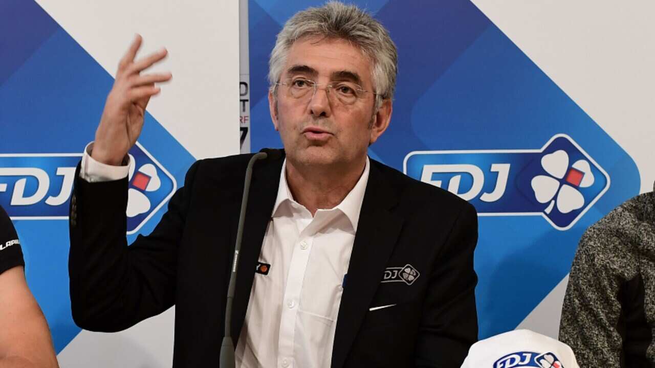 Groupama-FDJ manager Marc Madiot gestures to the media during a press conference