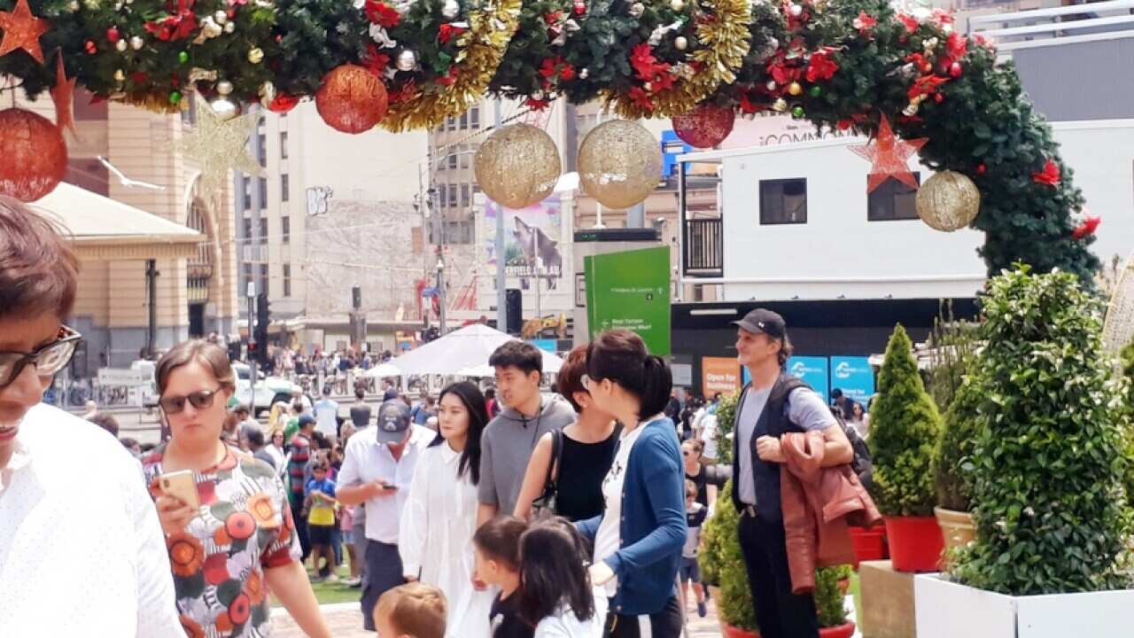 The crowd at Federation Square in Melbourne enjoying the festive season, Dec 2019.