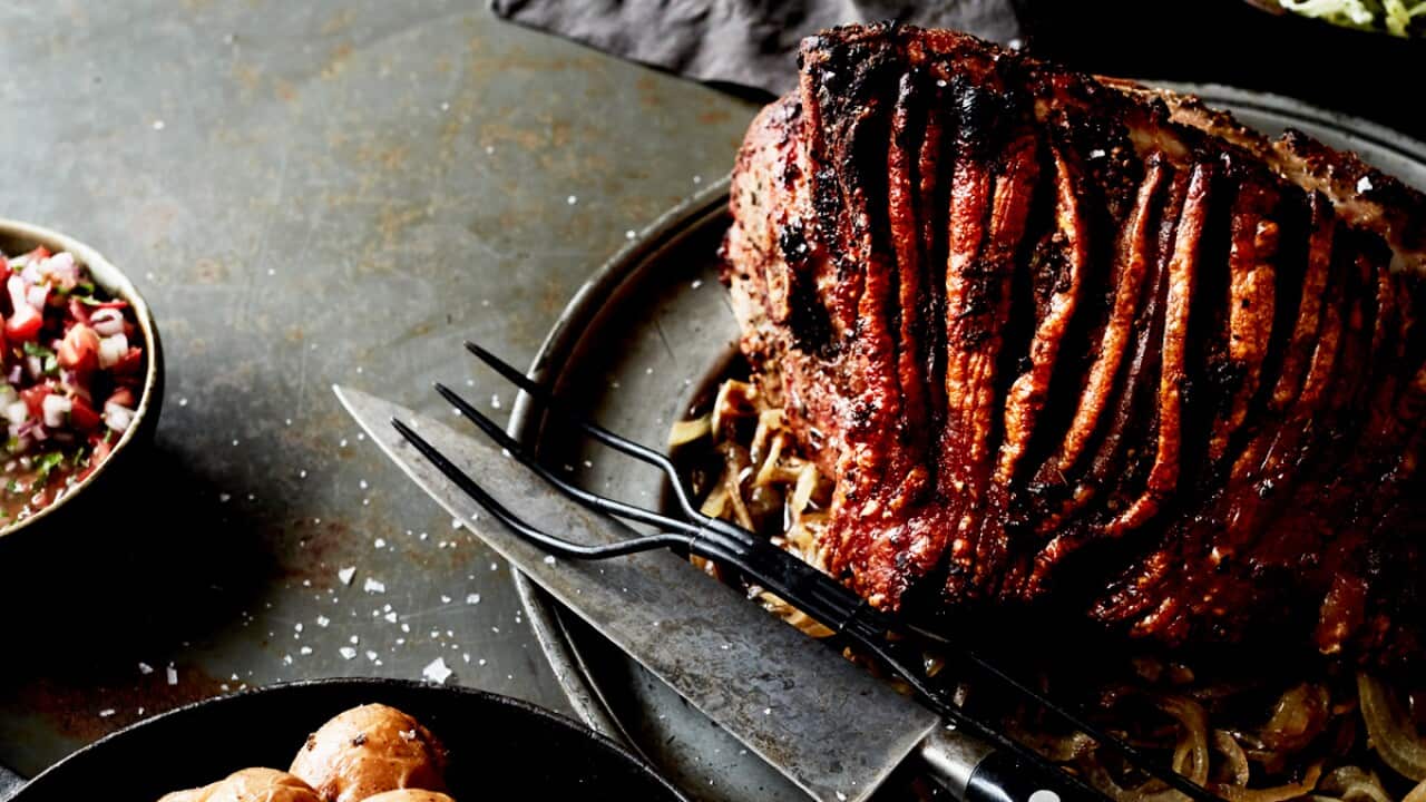 Ecuadorian slow-roasted pork with agrio sauce and salad
