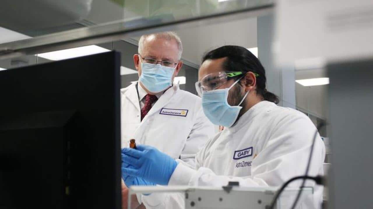 Australian Prime Minister Scott Morrison meets with team member Gaby Atencio in the Analytical Laboratory during a visit to AstraZeneca laboratories in Sydney.