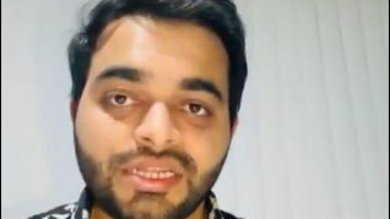 A man in a collared shirt 