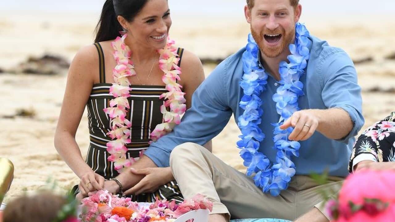 Harry and Meghan on Bondi beach on day four of their visit.