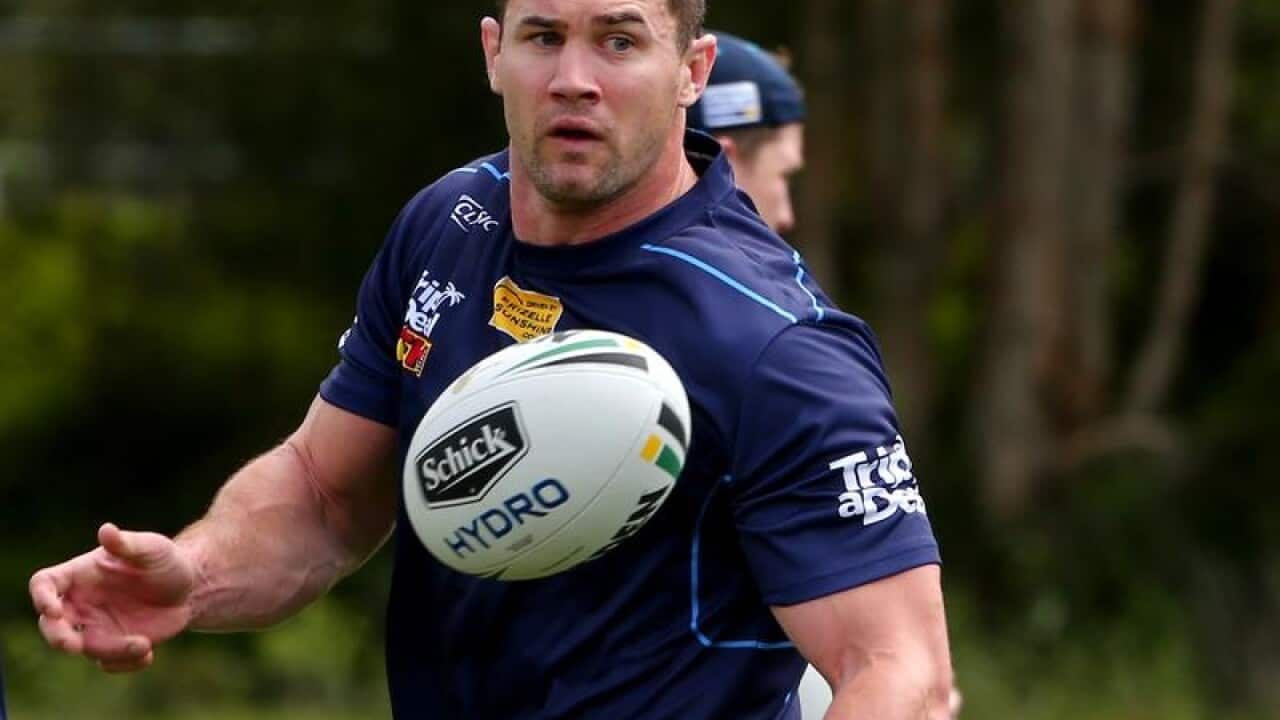 Gold Coast Titans player Brenton Lawrence (C)