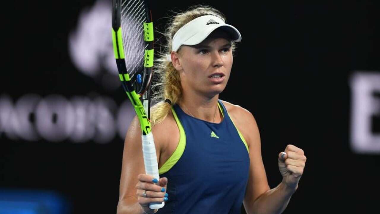 Caroline Wozniacki of Denmark celebrates her win.