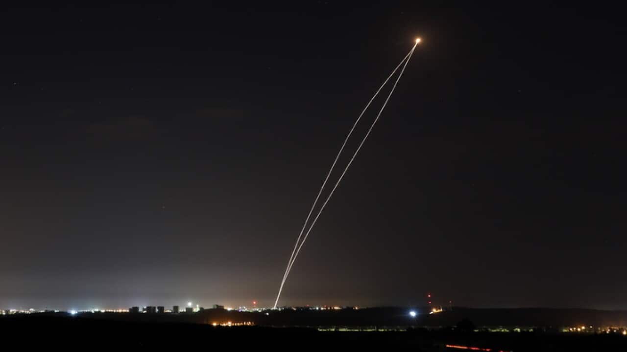 A rocket fired from Gaza is intercepted by an Israeli Iron Dome anti-missile defence system