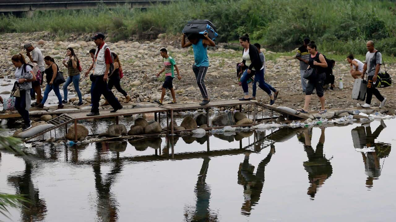 Venezuelans cross illegally into Colombia near the Simon Bolivar International Bridge, close to Cucuta, Colombia.  