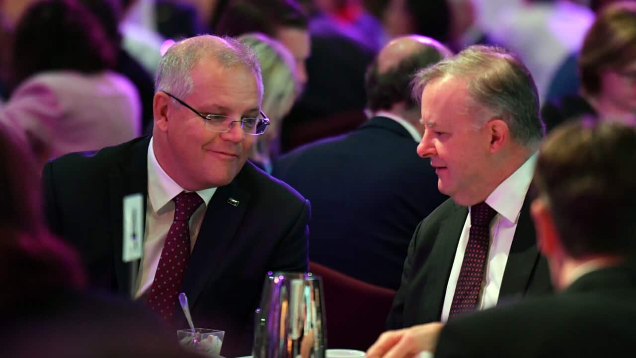 Prime Minister Scott Morrison and Leader of the Opposition Anthony Albanese at the prayer breakfast at Parliament.