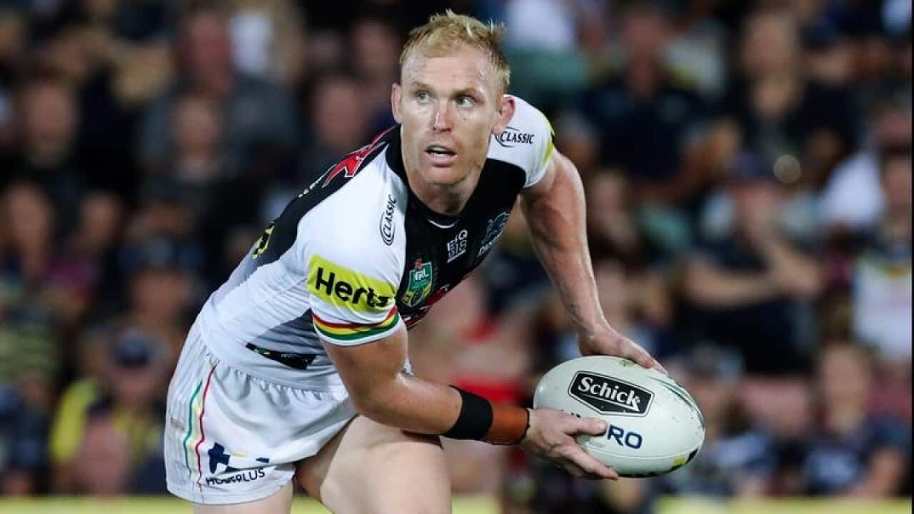 Peter Wallace, Captain of the Panthers gets a pass away.