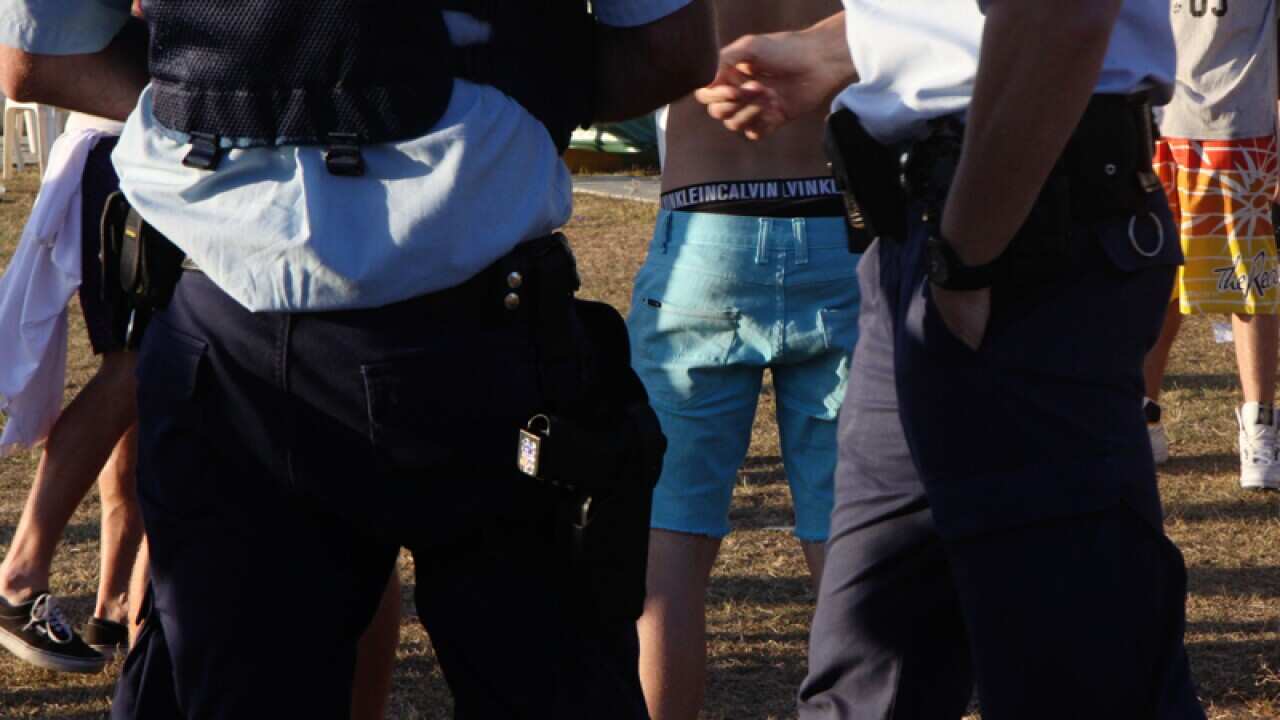 Police patrol a music festival in Sydney