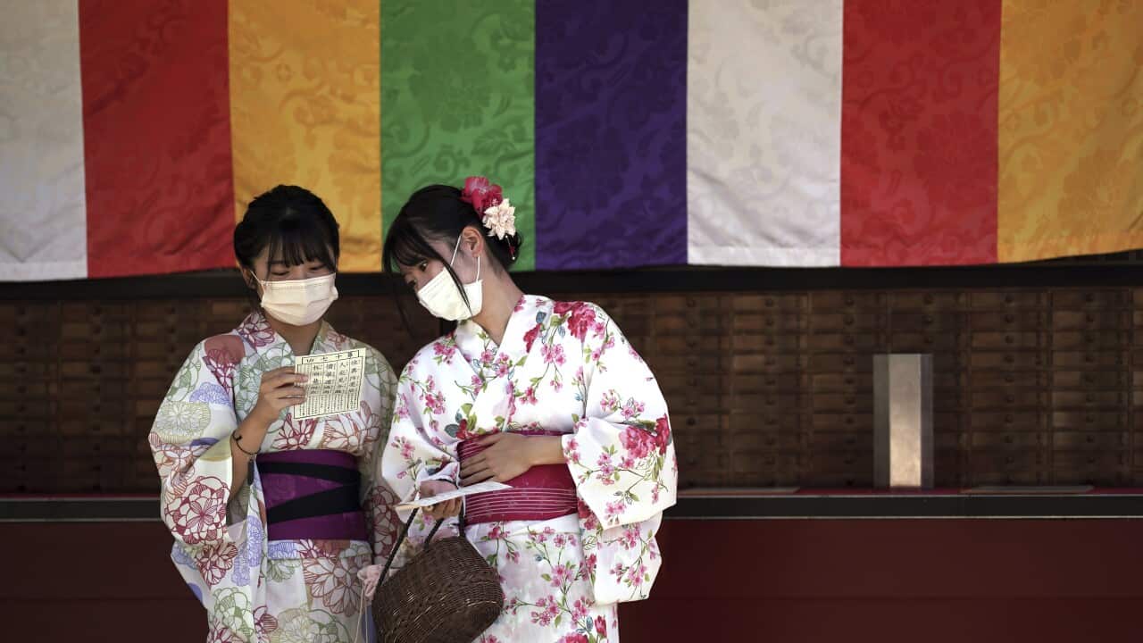 Virus Outbreak WHO Pandemic Downgrade