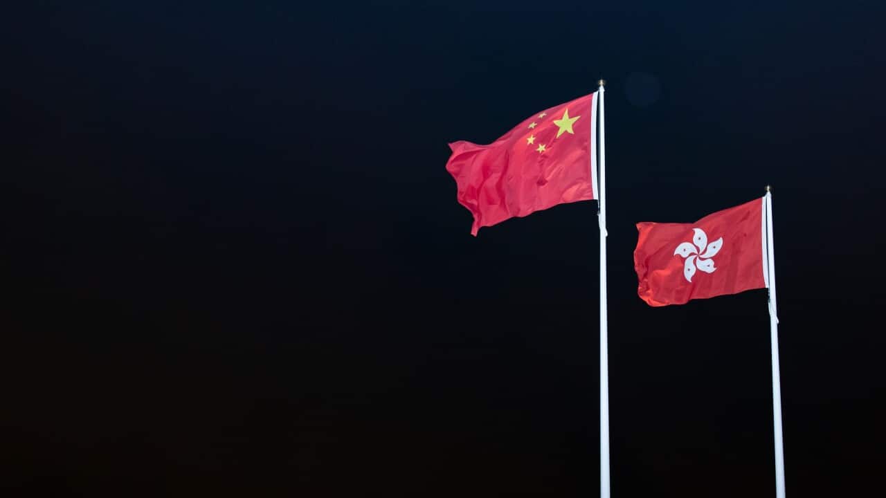 China and Hong Kong flags outside the legislation council in Hong Kong