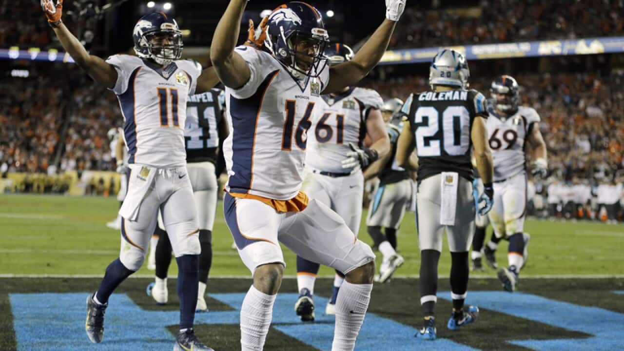 Denver Broncos’ Bennie Fowler celebrates after scoring a conversion