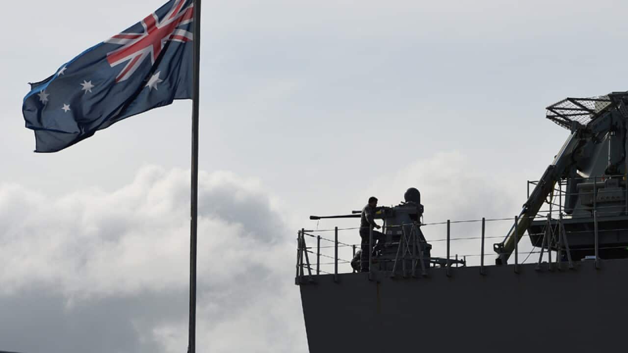 A Royal Australian Navy sailer on board HMAS Canberra