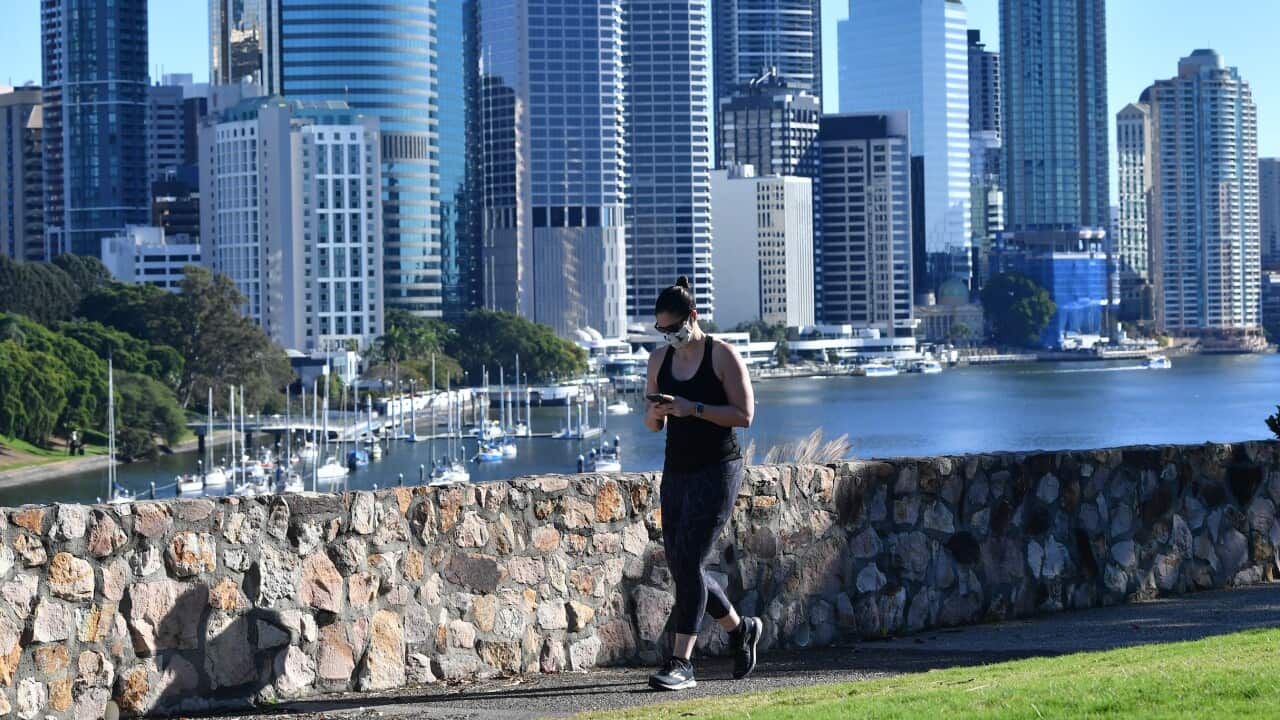 A woman is seen exercising at Kangaroo Point in Brisbane, Thursday, August 5, 2021, as the city remains in lockdown.