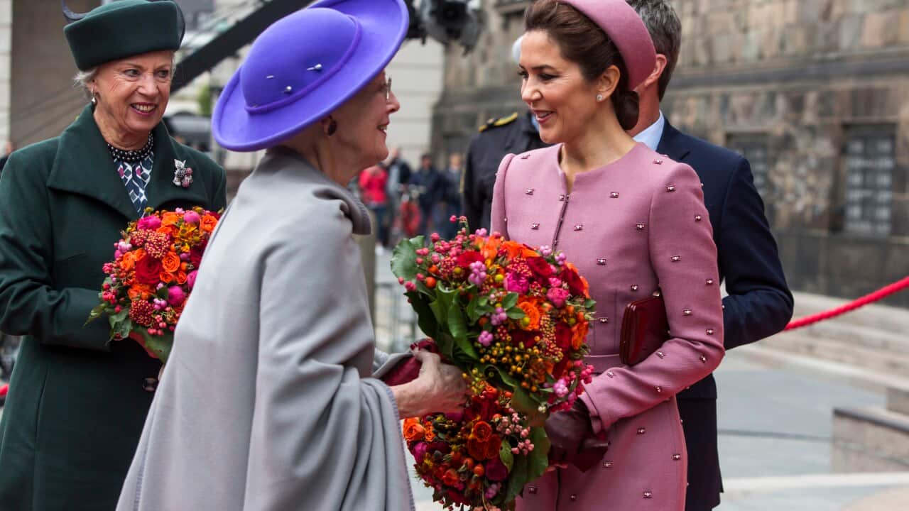 Queen Margrethe of Denmark greets Australian-born Princess Mary