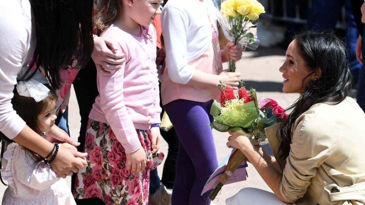 Meghan the Duchess of Sussex is seen meeting with fans.