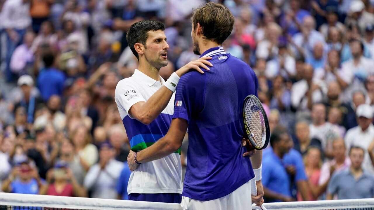 Novak Djokovic, of Serbia, left, congratulates Daniil Medvedev, of Russia, after Medvedev won the mens singles final of the US Open tennis championships.