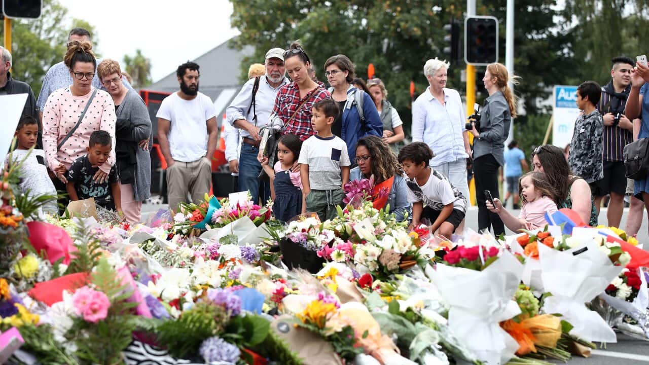 Mourners pay their respects at a makeshift memorial near the Masjid Al Noor mosque in Christchurch, New Zealand.