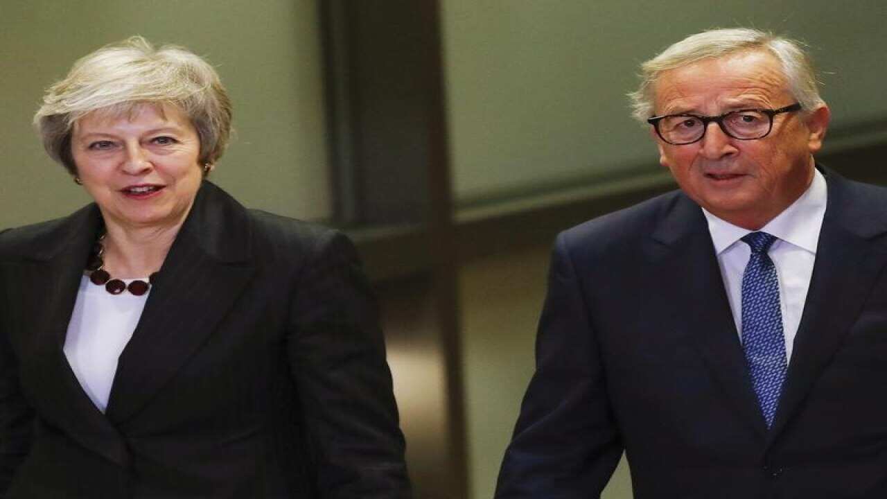 Theresa May and Jean-Claude Juncker in Brussels