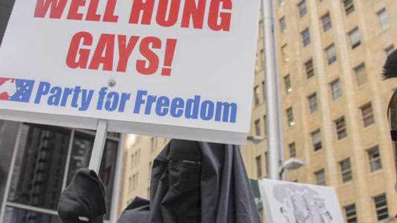 An anti-Islam sign is held as the Reclaim Australia movement held its Sydney rally on July 19, 2015. `