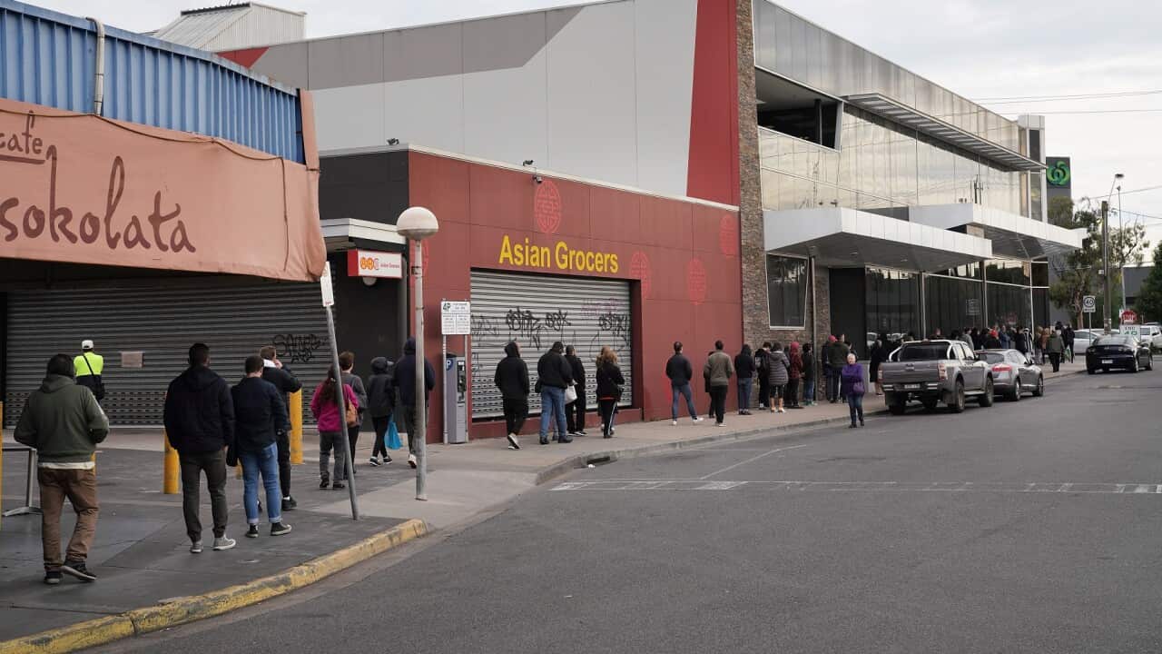 People queuing outside a Centrelink office in Preston, Melbourne