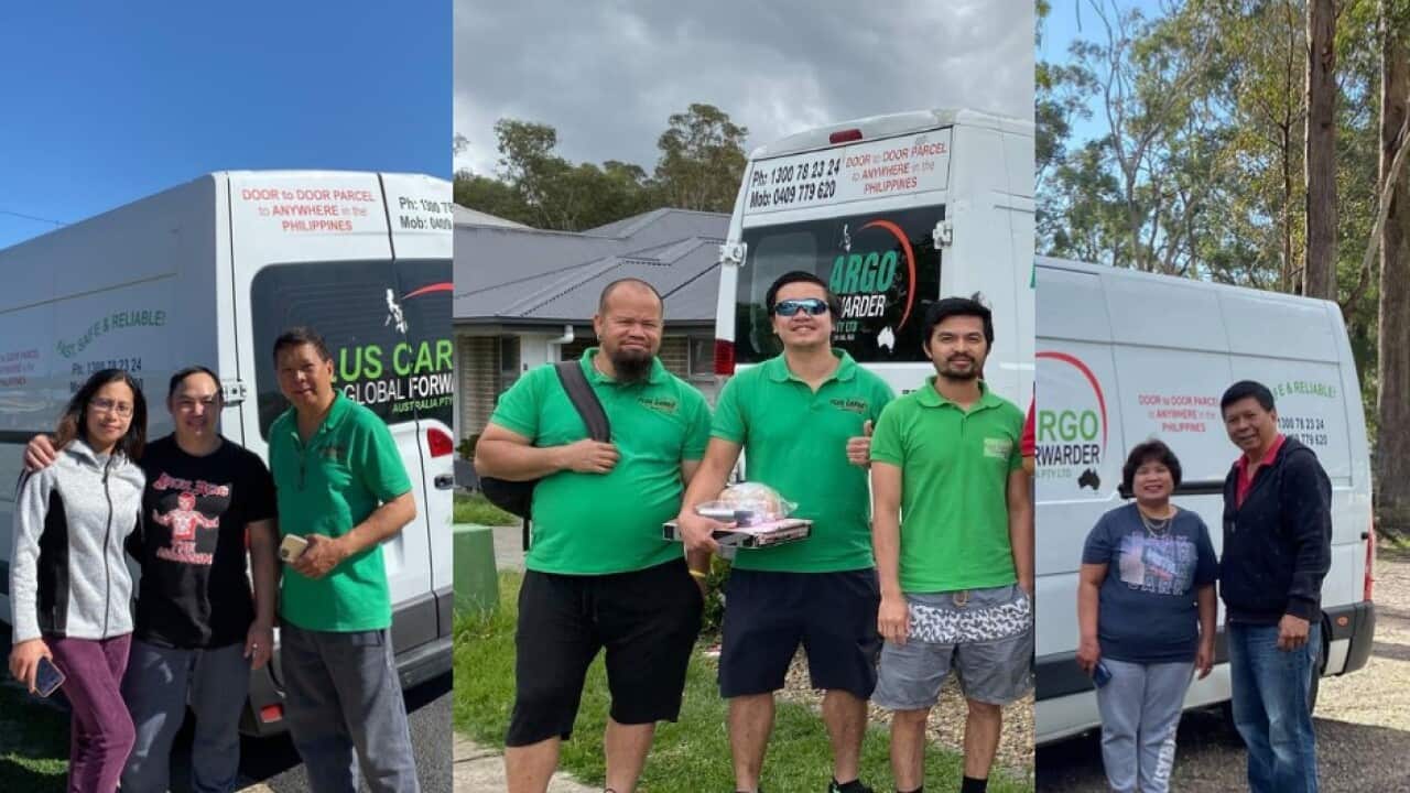 Loel Ortiz with some of the employees and agents all over Australia.jpg