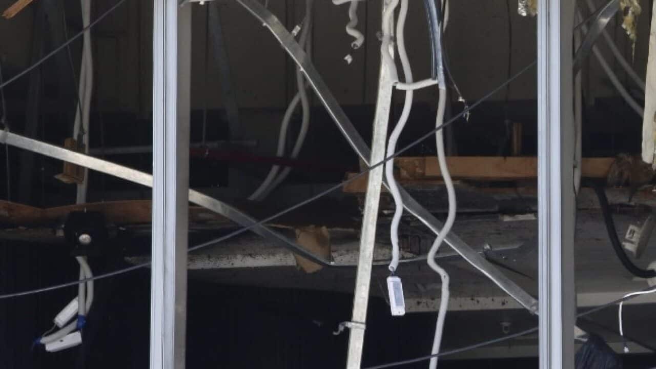 Sri Lankan police investigate the scene after an explosion hit Shangri-La Hotel in Colombo, Sri Lanka.