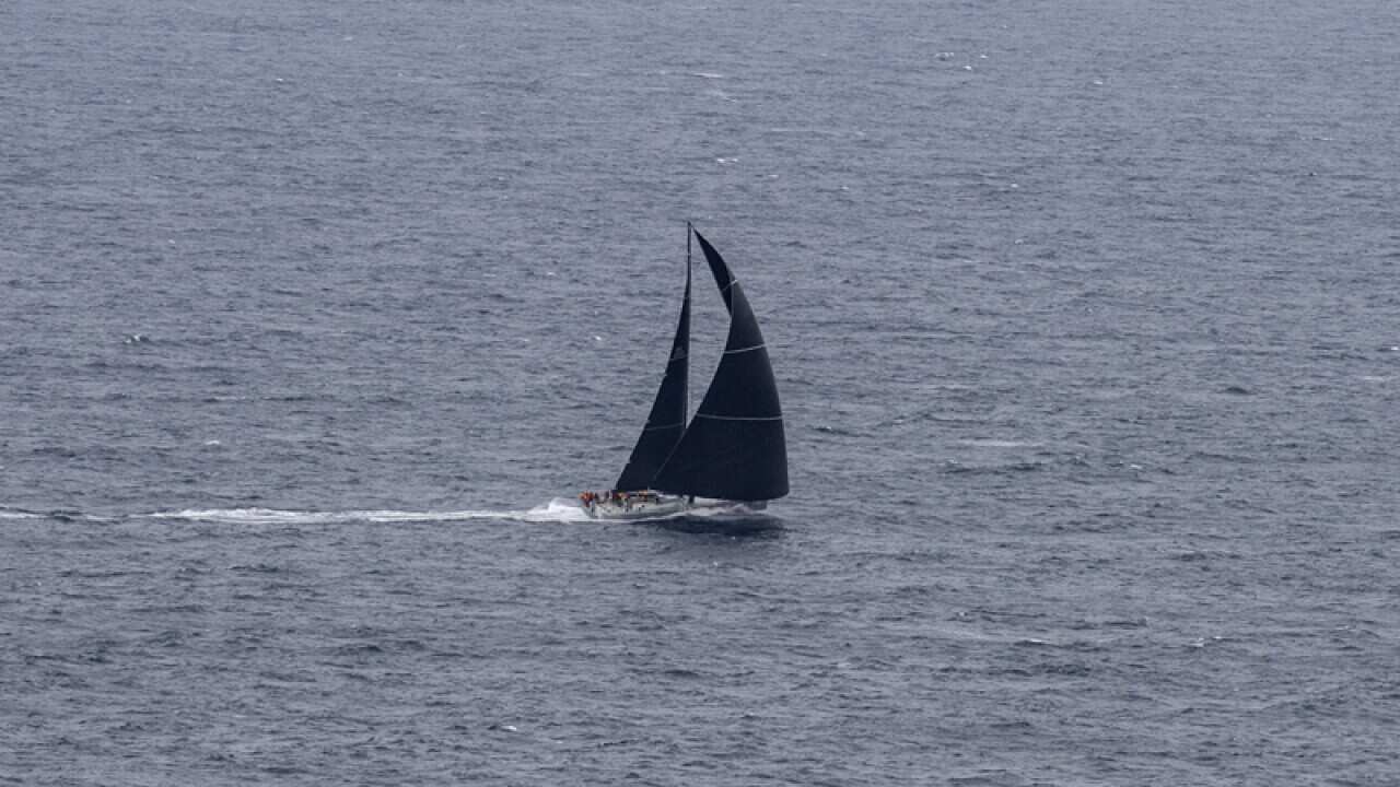 Rambler through the heads in the Sydney to Hobart yacht race