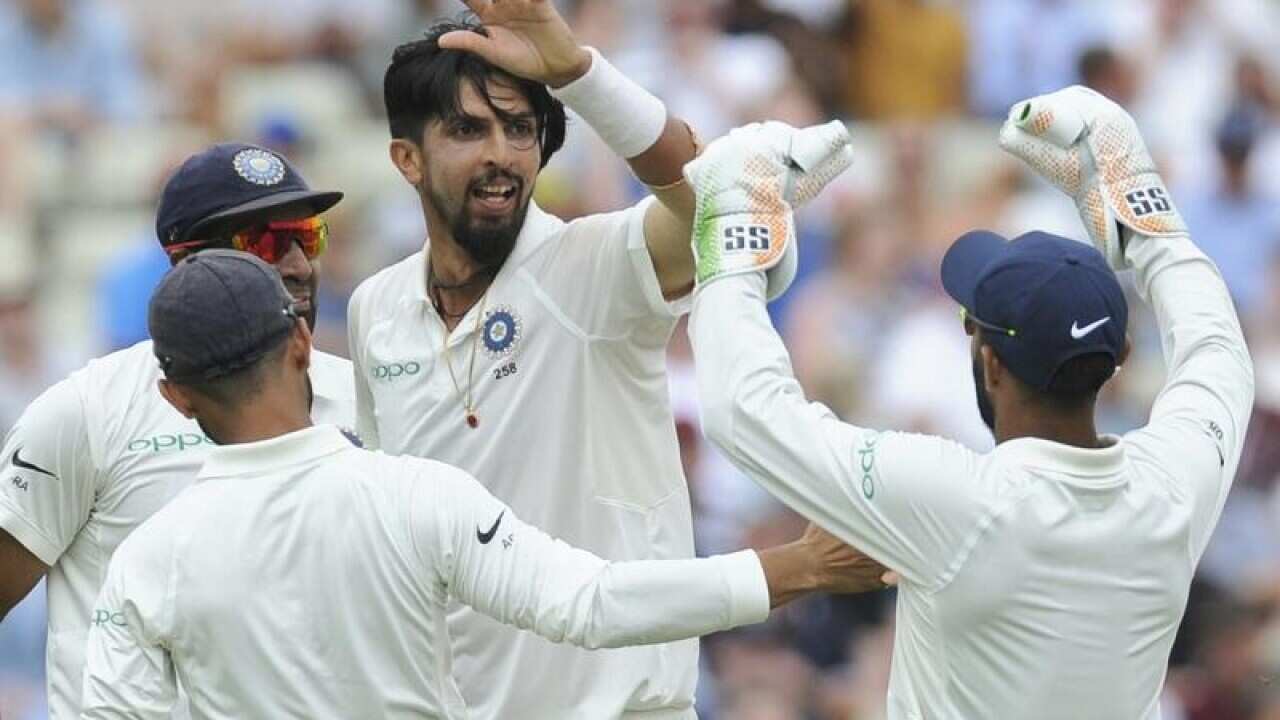 India's Ishant Sharma (C) celebrates with teammates