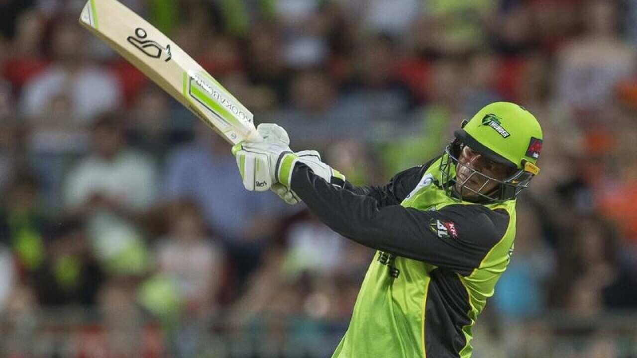 Usman Khawaja of the Thunder hits a 6